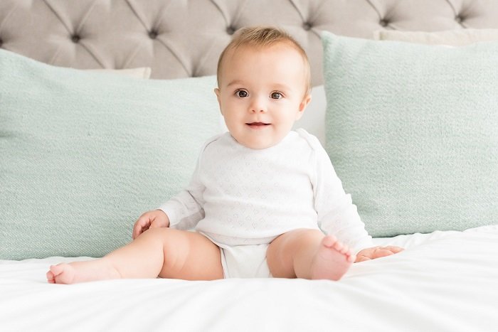 sự phát triển của trẻ sơ sinh 6 tháng tuổi về khả năng ngồi